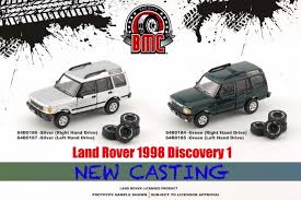1/64 1998 Land Rover Discovery 1, silver left hand drive with an extra set of off road tires.